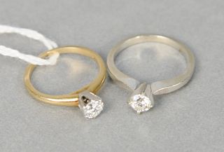 Two 14 karat yellow gold and diamond engagement rings, each set with center diamond approximately .25 carats, sizes 3.5 and 2.75.