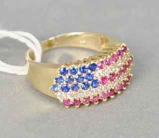 14 karat gold and cubic zirconia ring in the form of a United States flag accented by cubic zirconia, size 6.