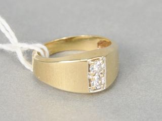 14 karat yellow gold ring set with two small diamonds approximately .35 carats total weight, size 5.5.