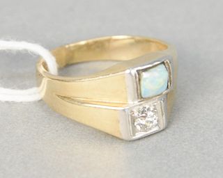 14 karat yellow gold ring set with diamond and opal, 8 grams, size 6.25.