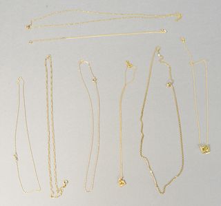 14 karat group of eight chains and pendants, 17 grams.