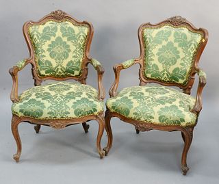 Pair of Louis XV style upholstered armchairs.