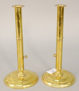Pair of English brass side push-up candlesticks, ht. 9 1/4". Estate of Marilyn Ware Strasburg, PA.