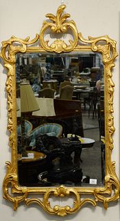 Chippendale style gold framed mirror with beveled mirror, 45" x 26".