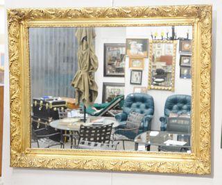 Two large mirrors, one with gold frame 38" x 48", the other contemporary with silver frame 48" x 29."