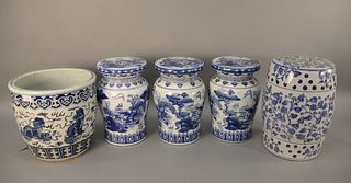 Five piece blue and white porcelain lot, four garden seats and one planter, tallest 18". Provenance: Estate of Mark W. Izard MD, Cider Brook Road, Avo