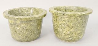 Two large Chinese carved green hardstone pots or planters, sixes incised with flowers, ht. 7 1/2" and 8 1/2", dia. 11 1/2".