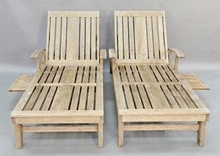 Pair of Frontgate teak outdoor chaise lounges, retail for approximately $2,000 a piece, 72".
