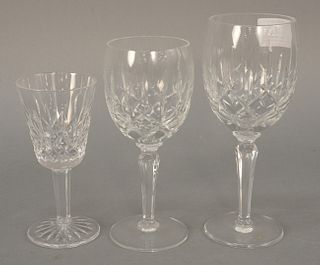 Set of eighteen Waterford and Gorham stems to include 6 white wine, 7"; 12 champagne, 5 1/2", along with 9 large red wine pressed glass stems, ht. 7 3