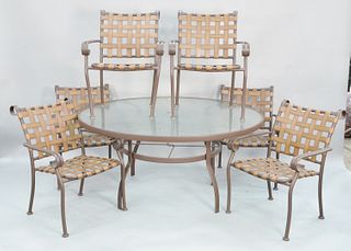 Woodard seven piece outdoor patio set with six armchairs and round glass top table, dia. 60".