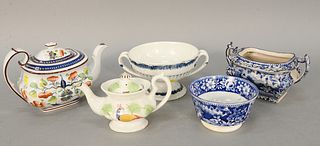 Five piece group to include Spatterware peacock creamer (as is); Goudy Dutch teapot, chipped, ht. 5 3/4"; Wedgewood footed bowl; two Staffordshire pie