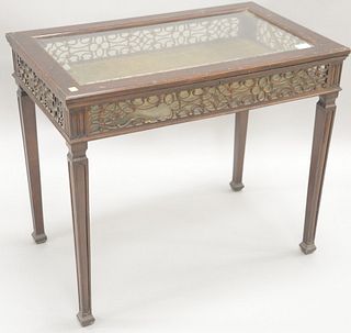 Mahogany Chippendale style curio table having beveled glass top, ht. 28", top 20" x 33".
