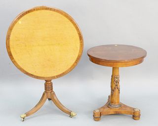 Two piece lot to include tip table with birdseye maple top, ht. 29", dia. 30" along with a side table having a carved shaft, ht. 28", dia. 24".
