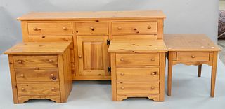 Four piece bedroom set to include a long chest, ht. 34", wd. 68"; pair of nightstands along with an entertainment cabinet. Estate of Marilyn Ware Stra