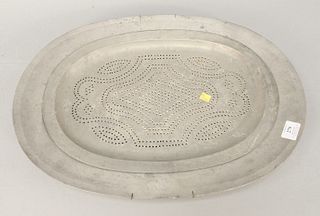 Large 19th C. pewter platter with fitted strainer center, 17" x 22 1/2". Estate of Marilyn Ware Strasburg, PA.