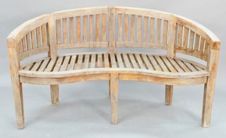 Outdoor teak bench with curved back, ht. 33 1/2", wd. 60", seat dp. 22", some old finish.