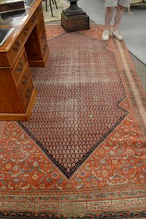 Oriental area rug with wear 5'10" x 11'7".