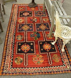 Oriental throw rug, 5' x 9'.