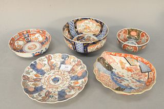 Five Imari porcelain dishes, tall bowl with painted panels, scallop leaf form dish, 19th C. and a scallop rim plate, two small bowls, largest dia. 8 1