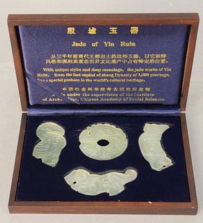Jade of Yin Ruin, four piece carved group in fitted box.