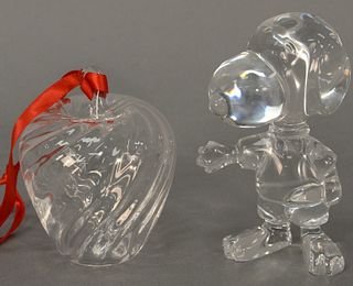 Two crystal pieces to include Baccarat crystal Snoopy figure in original box, signed, ht. 4" signed "Baccarat" and a Steuben crystal apple, ht. 3 1/4"