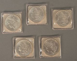 Five Morgan silver dollars to include 1896, (2) 1882 and (2) 1900. Provenance: Ida Cion Estate 1989, sold Nadeau’s Auction Gallery 1989, Estate of Hyl