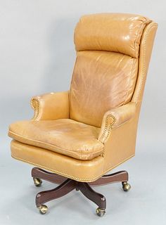 Hancock & Moore executive leather office chair having brass rivets and swivel base, ht. 46".