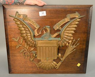 Bronze eagle plaque "Pluribus Unum " on backing, 17" x 21".