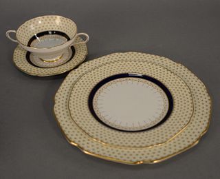 Paragon 106 piece porcelain dinnerware, ivory with gilt decoration and royal blue banding, to include 15 dinner plates, 14 luncheon plates, 15 bread p