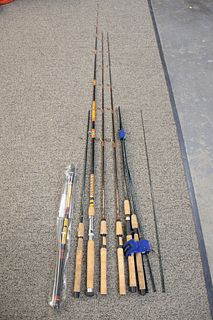Six piece lot of Graphite spinning rods to include 2 Fenwick 6' 1/2"; 3 Cabelas fish eagles, 7'. Estate of Michael Coe, PhD, New Haven, CT.