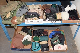 Five tray lots ton include four fishing vests, hats, socks, reel covers, etc. Estate of Michael Coe, PhD, New Haven, CT.