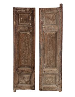 Two Persian Door Panels
Height of first overall 68 3/4 x width 18 1/2 inches; height of second overall 67 3/4 x width 17 3/4 inches.