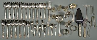 Misc. flatware, napkin rings and salt shakers, 44 items
