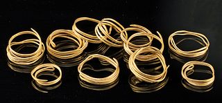 An Ensemble of 13 Greek 20K+ Gold Hair Coils