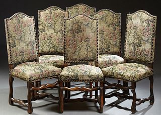 Set of Six Louis XIII Style Carved Beech Dining Chairs, 19th c., the arched crestrail above a canted back and trapezoidal seat, on s...