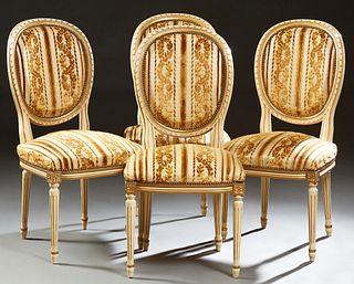 Set of Four Polychromed Beech Louis XVI Style Upholstered Dining Chairs, 20th c., the curved oval medallion backs over bowed seats,...