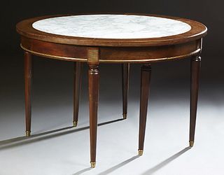 French Louis XVI Style Ormolu Mounted Circular Marble and Mahogany Dining Table, 20th c., the inset figured white marble top opening...