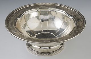 Sterling Silver Footed Lobed Center Bowl, 20th c., # A408-73, by Dominick and Haff, the repousse rim with repousse garlands and oval...