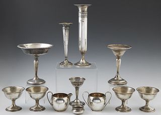 Twelve Sterling Pieces, consisting of a creamer and sugar by Gorham; 4 sorbet cups; a wine glass holder; creamer and sugar; salt; li...