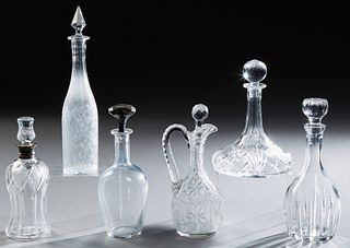Group of Six Crystal Decanters and Stoppers, early 20th c., consisting of a Waterford "Marquis" example; a cut crystal handled examp...