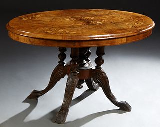English Inlaid Walnut Oval Loo Table, c. 1860, the center with elaborate floral inlay, the border with line inlay, on four turned su...