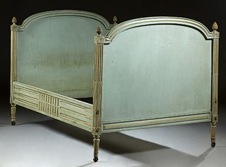 Louis XVI Style French Carved Polychromed Beech Lit du Coin, c. 1870, the arched sleigh ends flanked by reeded supports with pineapp...