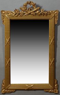 French Louis XVI Style Gilt and Gesso Overmantle Mirror, late 19th c., with a pierced wreath, quiver and torch crest flanked by leav...