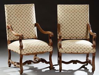 Pair of French Louis XIII Style Carved Walnut Fauteuils, early 20th c