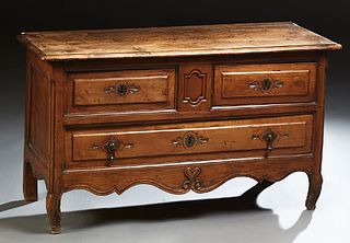 French Provincial Louis XV Style Commode, 19th c., the stepped rounded corner and edge top over two frieze drawers and a lower drawe...