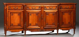 Louis XVI Style Carved Cherry Sideboard, 20th c., the stepped bowed cookie corner parquetry inlaid top over two central frieze drawe...
