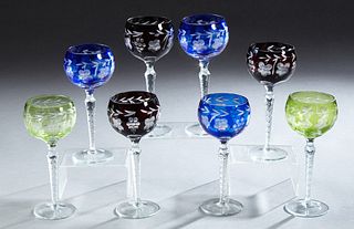 Set of Eight Cut to Clear Crystal Wine Stems, 20th c., three in purple, three blue and two green, H.- 8 1/2 in., Dia.- 3 5/8 in.