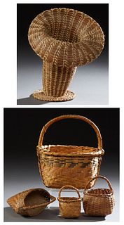 Group of Native American Baskets, 20th c., consisting of three Cherokee market baskets; a Cherokee heart-shaped flower basket; and a...