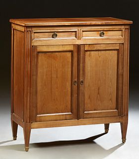 French Louis XVI Style Carved Cherry Sideboard, 20th c., the stepped rectangular top over two frieze drawers and double cupboard doo...