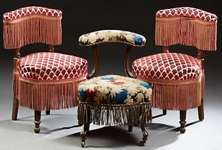 Three French Napoleon III Style Carved Mahogany Upholstered Chairs, c. 1870, each with a curved upholstered crest rail above an upho...